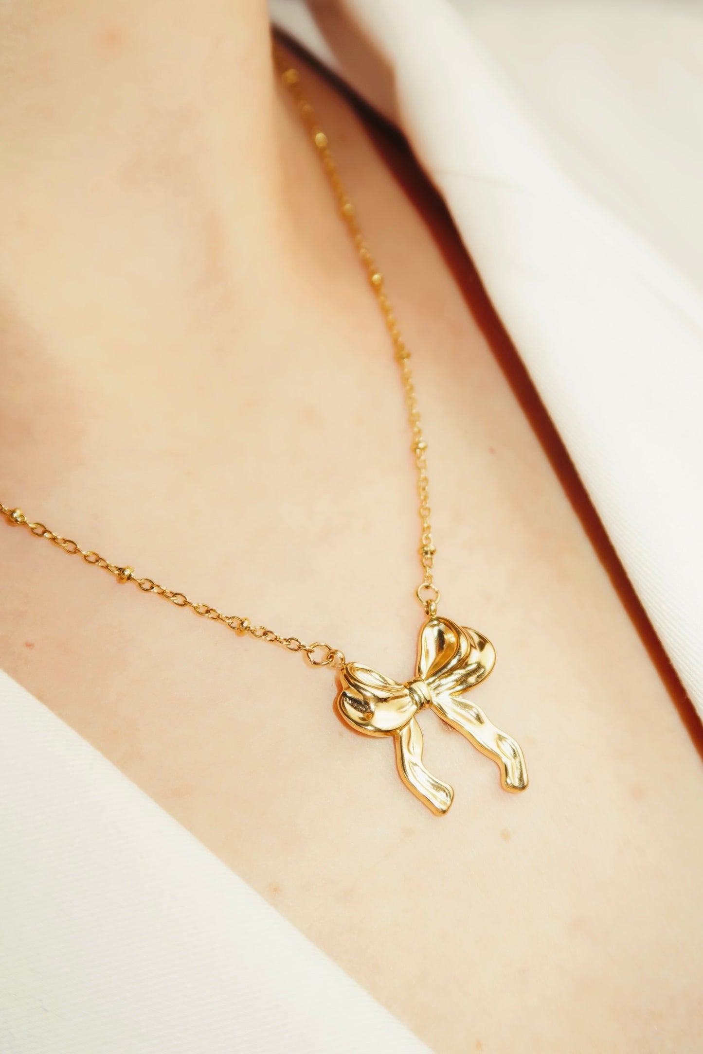 Gold Bow necklace